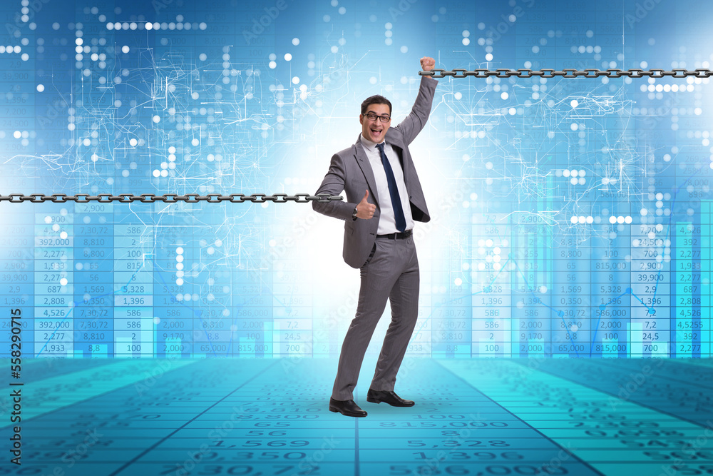 Chained businessman in workaholic concept Chained businessman in workaholic concept