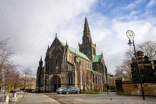 Glasglow Cathedral , The oldest cathedral church in mainland Scotland with classic gothic architecture during winter sunny day at Glasgow , Scotland : 27 February 2018 photo