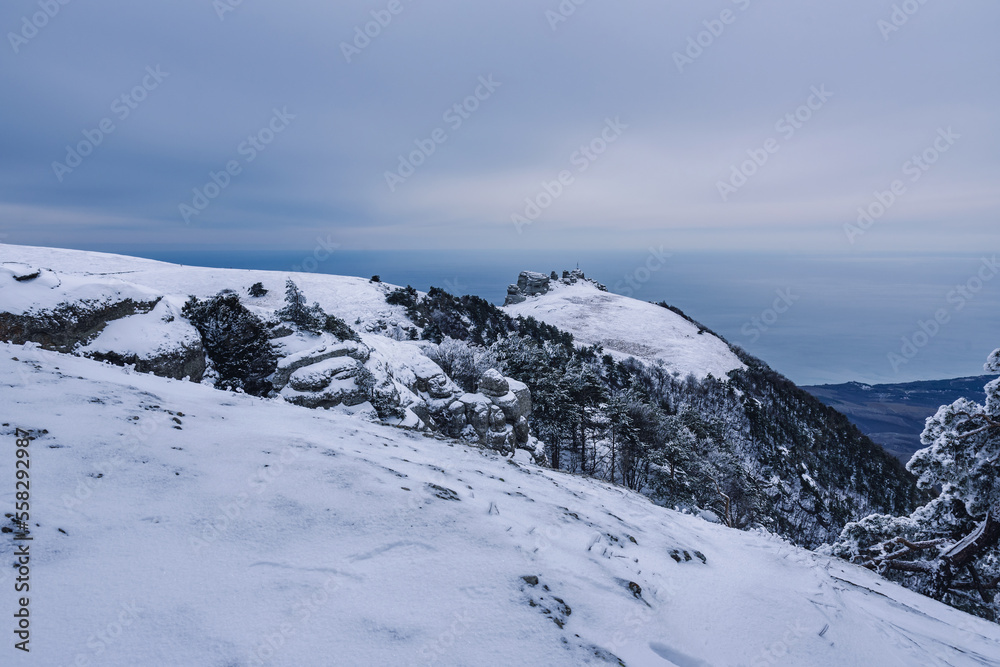 View on the top of Mount Alenga. Southern Demerdzhi in snow and ice in spring. Crimea