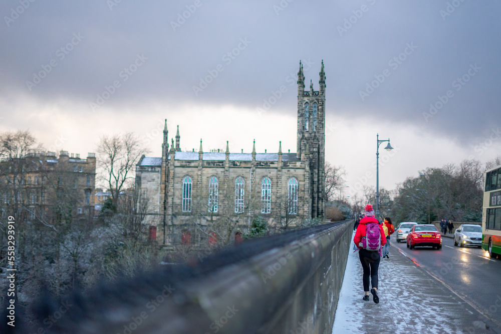 Obraz premium View of Edinburgh old towns around Dean Bridge & Rhema Christian Centre Church during winter snow evening at Edinburgh , Scotland : 27 February 2018