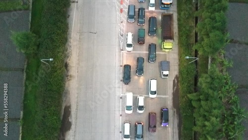 Aerial view of congestion at Soreang Pasir Koja Bandung toll gate in the afternoon photo