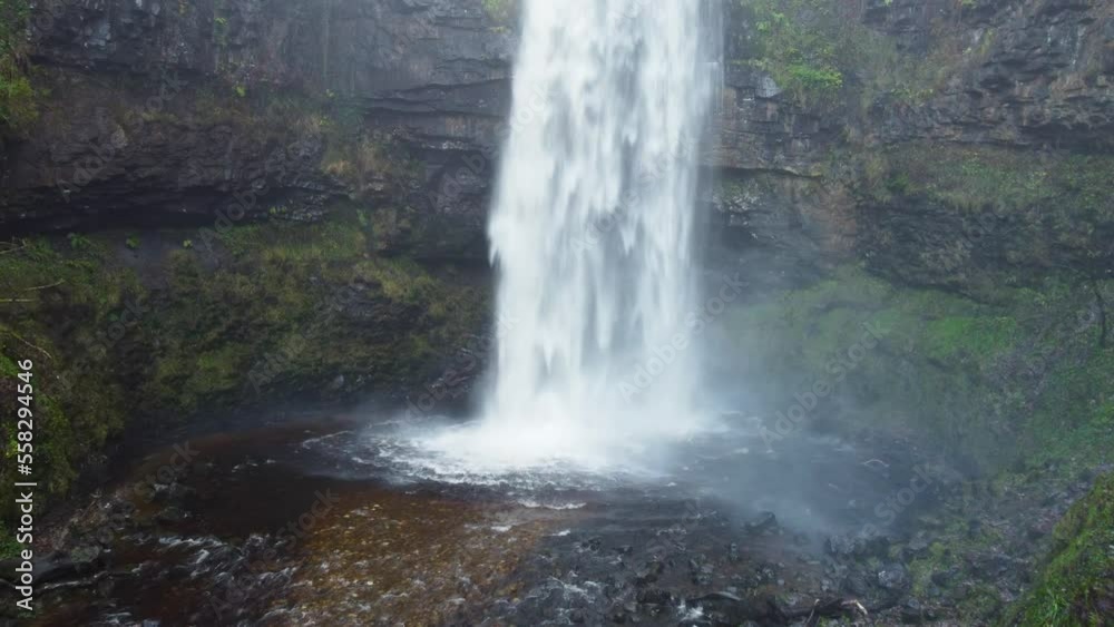 Slow Pushing Aerial Drone shot of Dramatic Waterfall in Wales UK 4K Slow Pushing Aerial Drone shot of Dramatic Waterfall in Wales UK 4K