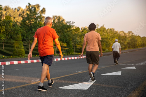 Senior people  exercise walking  at public park healthy  lifestyle  concept.