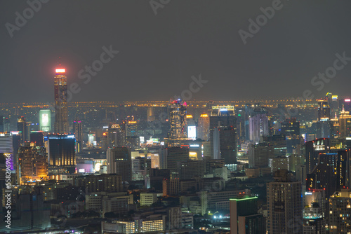 Aerial view of Bangkok Downtown Skyline, Thailand. Financial district and business centers in smart urban city in Asia. Skyscraper and high-rise buildings at night.