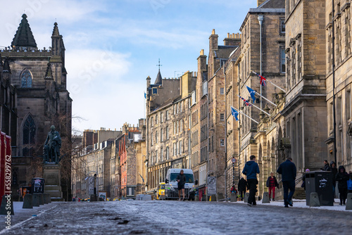 The Royal Miles Street , Historic streets in the heart of Edinburgh old towns during winter snow afternoon in Edinburgh , Scotland : 28 February 2018 photo