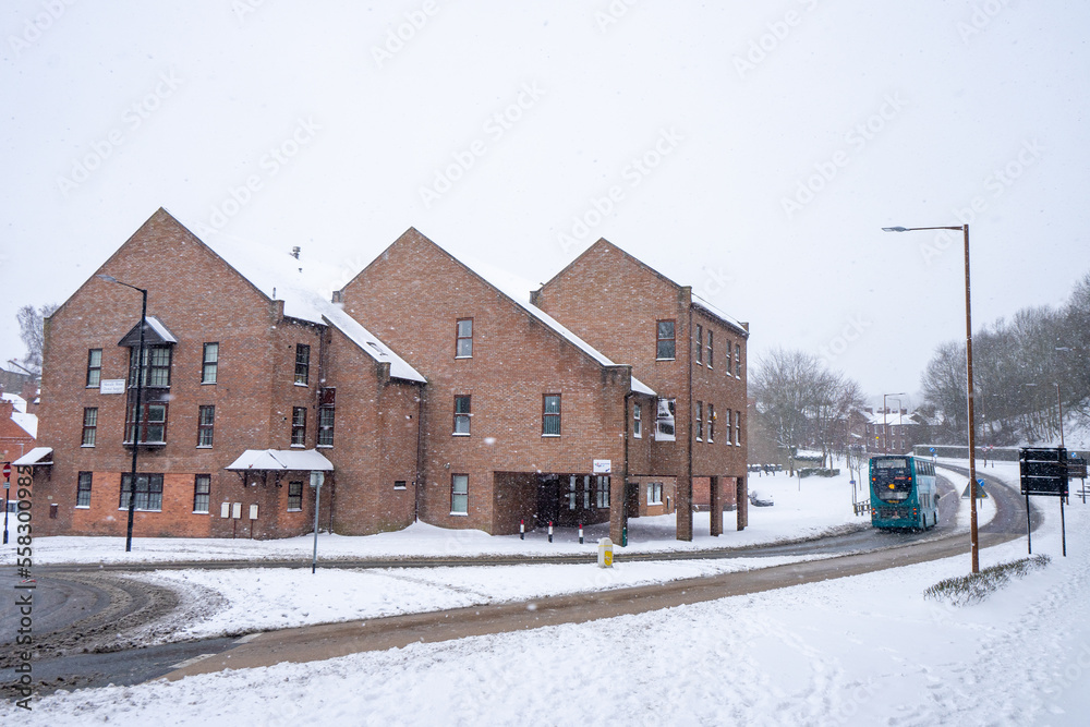 View of buildings housing near Durham Viaduct in Durham during winter snow morning at Durham , United Kingdom : 1 March 2018 View of buildings housing near Durham Viaduct in Durham during winter snow morning at Durham , United Kingdom : 1 March 2018