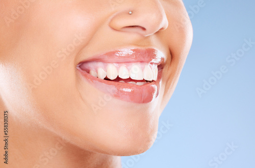 Teeth  mouth and beauty with woman and smile  dental care and Invisalign with teeth whitening and lips against studio background. Face  healthy skin and veneers with cosmetic care and lip filler zoom