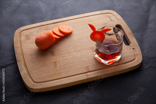 carrot rabbit and a glass of whiskey