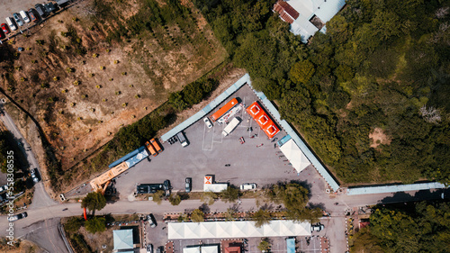 National park Kuala Tahan village parking space high angle view. Drone aerial photo. photo