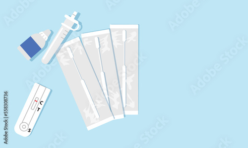 View from above of an antigen test kit (ATK), or home kit, containing three swab in sealed wrappers, a sample extraction bottle, an extraction tube and a test device. Positivity to covid-19 detection.
