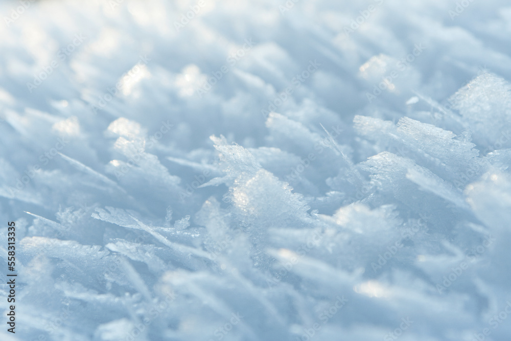 Thin crust of ice over snow, hoarfrost. Texture or background