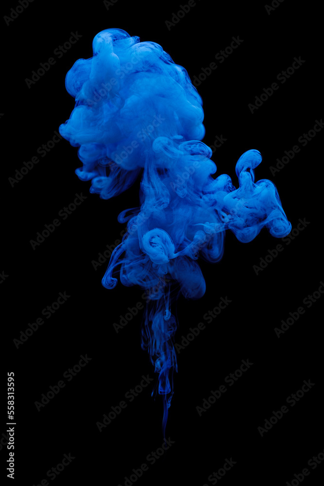 Blue ink swirling in water isolated on black background