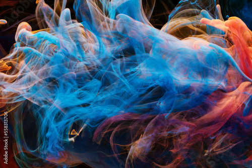 Obraz na płótnie A mixture of colorful ink swirls in water on a black background. Abstract concept photo w salonie