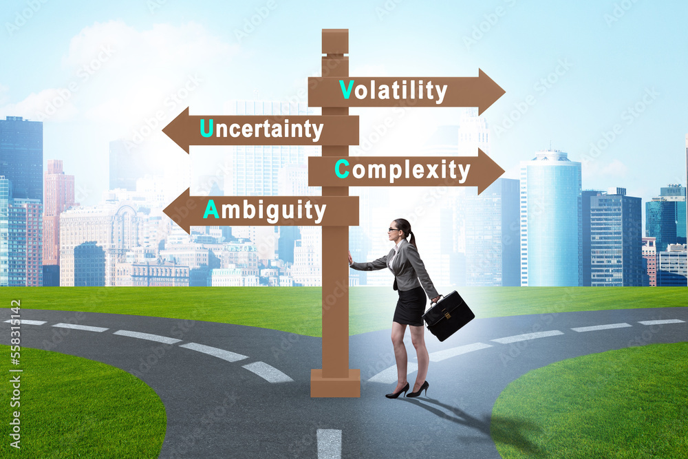 Businesswoman at the crossroads at VUCA concept Businesswoman at the crossroads at VUCA concept