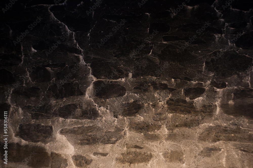 Texture of a stone wall. Old chimney wall textured background. Stone