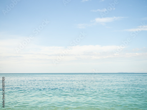 Sea Summer Background,Shore Blue Sea Blue Sky Seascape,Beautiful Water Tropical Nature Landscape,White Cloud Beautiful with Smooth Wave Calm Wallpaper,for Tourism Vacation Relax Travel Holidays.