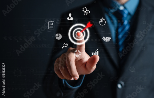 Businessman touching start button for strategy and action plan, targeting the business, investment growth and success development, achievement, goal, finance leadership and customer target group.