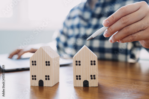 Signing home sales and insurance contracts with real estate agents, signing contracts to know the terms of buying and selling homes and real estate, contract signing ideas.