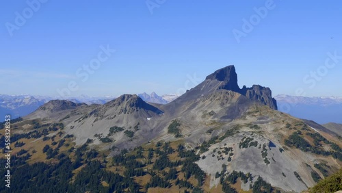 Black Tusk Volcanic Mountain Under Blue Sky In Garibaldi Provincial Park In Canada. wide photo