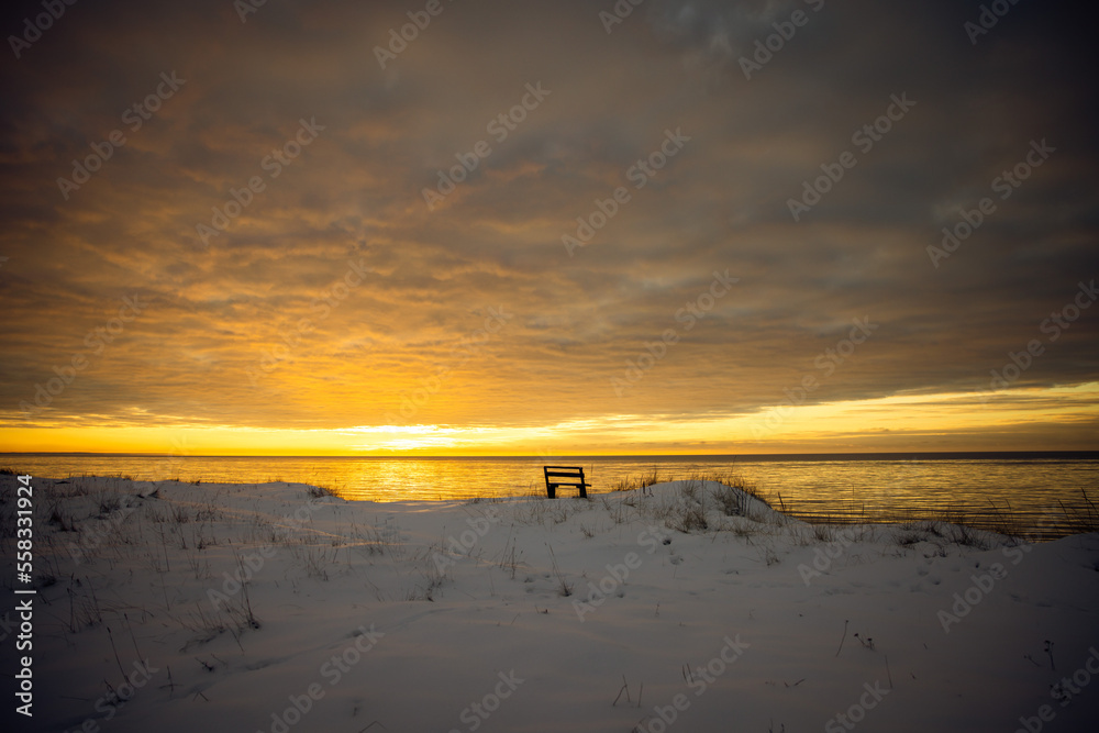 Naklejka premium Winter Sunset on the beach of Sarnate, Latvia