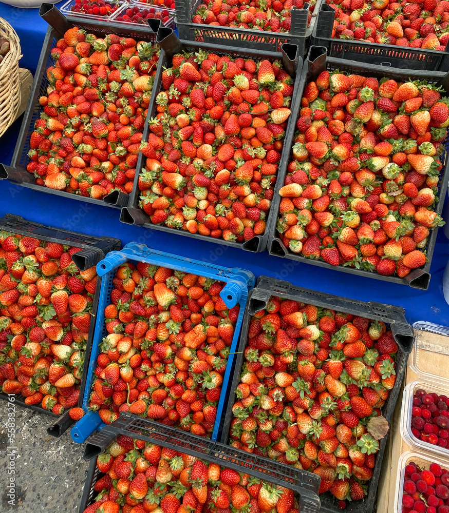 Freshly picked strawberries in the market.