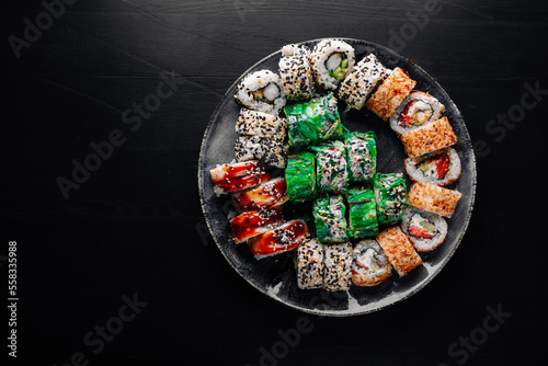 set of sushi roll in plate