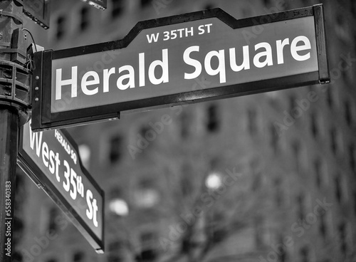 Herals Square street sign at night in New York City - Manhattan.