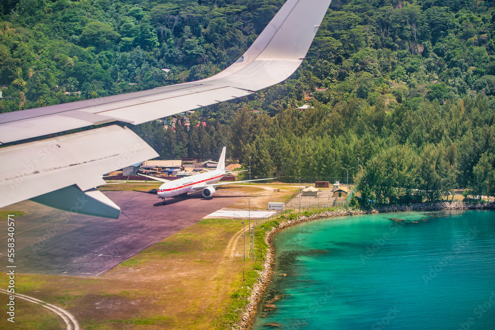 Aerial view of Mahe' Island Airport from airplane, Seychelles Aerial view of Mahe' Island Airport from airplane, Seychelles