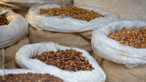 Coffee beans in burlap bags. Fresh coffee beans in the street shop. Selected focus, shallow depth. Istanbul, Turkey (Turkiye)