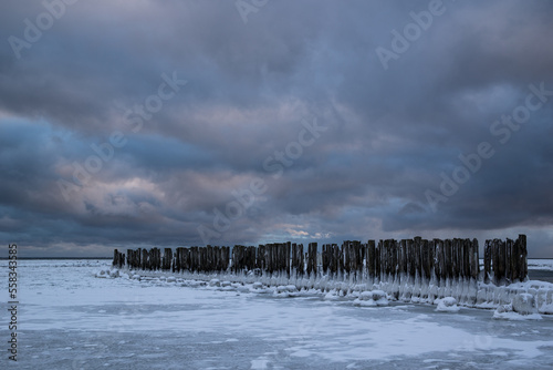zimowy widok na torpedownię w Babich Dołach w Gdyni, morze Bałtyckie photo