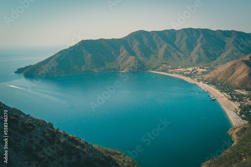 Sunrise above sea and pine tree with blue sea background Turkey