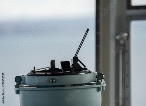 Foto Gyro compass located on navigation bridge of cargo ship