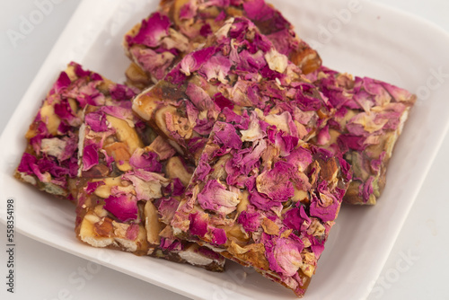 Rose Dry Fruit Chikki Also Called Gulab Til Gajak, Gazak, Gachak Are Sweet Brittle Candy Made Of Gud, Mungfali, Gur, Roasted Peanuts, Gulab Petals, Groundnut In Ghee. Makar Sankranti and Lohri Sweet