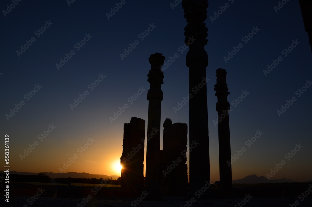 ancient columns of Persepolis in sunset
