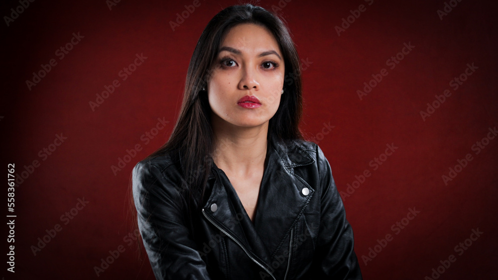 Portrait of a confident young woman - studio photography Portrait of a confident young woman - studio photography
