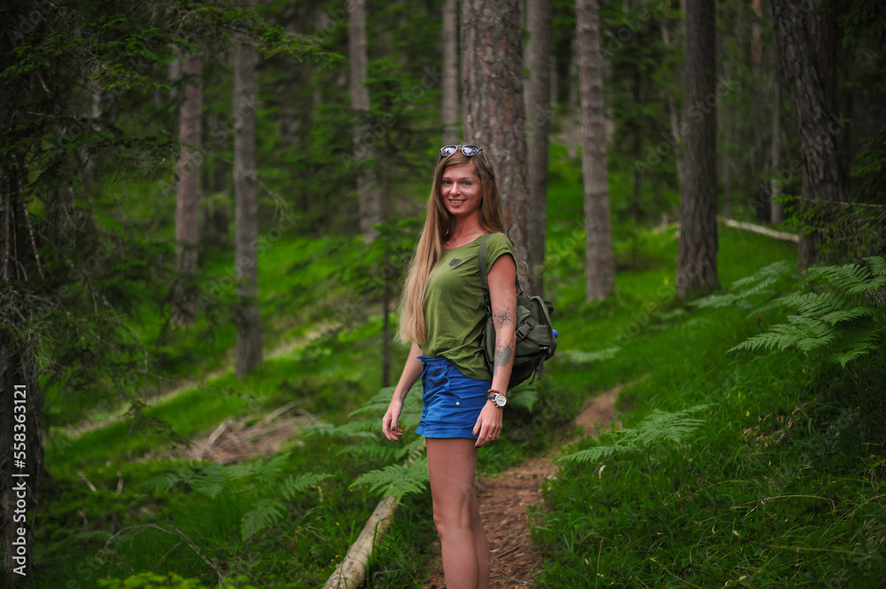 charming cute smiling girls with an open, honest faces against a forest in a soft light charming cute smiling girls with an open, honest faces against a forest in a soft light
