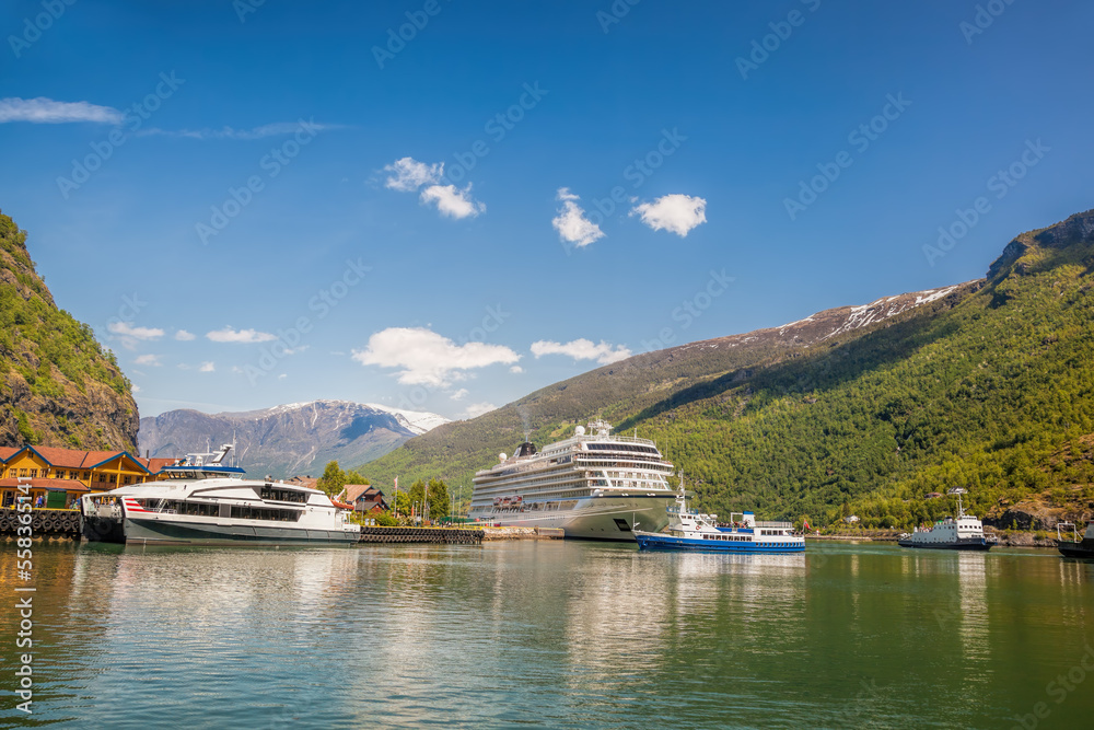 Fototapeta premium Port of Flam against fjord with cruise ship in Norway