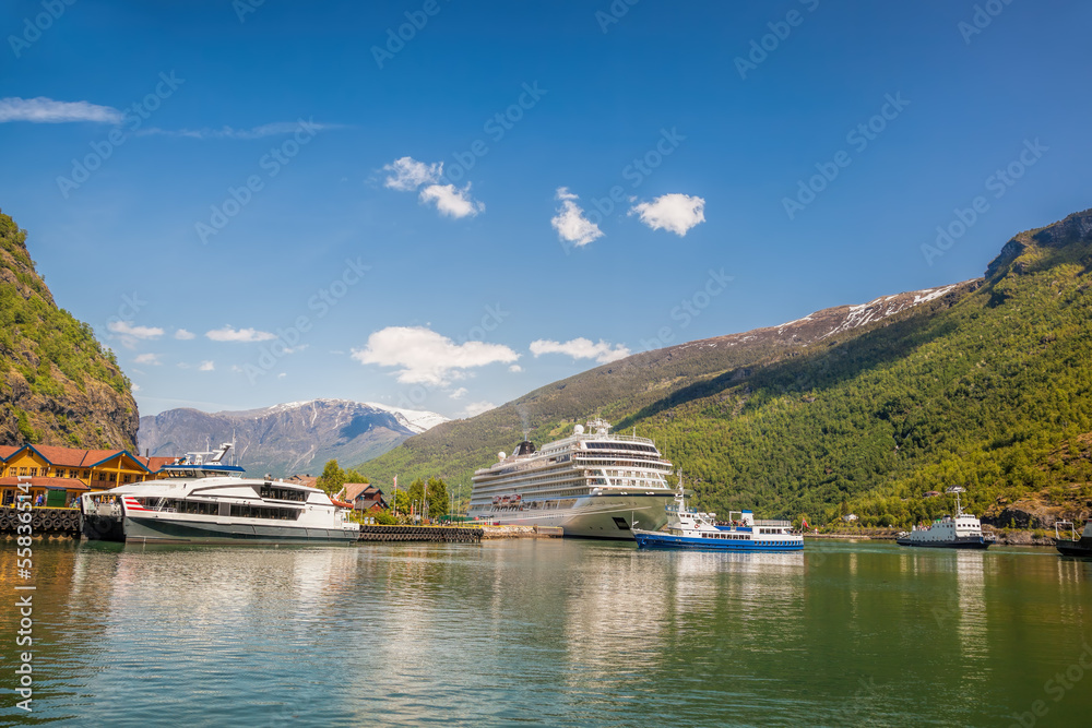 Port of Flam against fjord with cruise ship in Norway