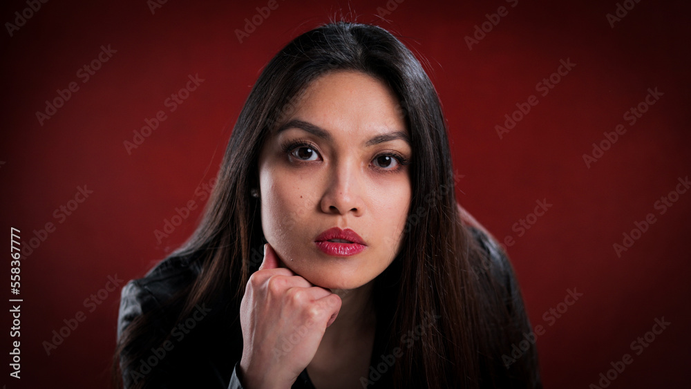 Portrait of a confident young woman - studio photography Portrait of a confident young woman - studio photography