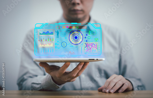 manager hold tablet graphic screen check for ligistics via gps map delivery business and pie diagram monitor for future economic technology concept photo