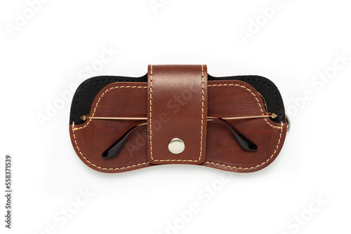 Brown leather sunglasses case on a white background.