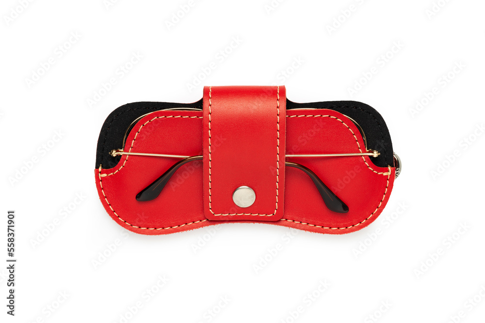 Red leather sunglasses case on a white background. Red leather sunglasses case on a white background.