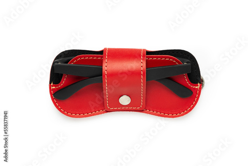 Red leather sunglasses case on a white background.