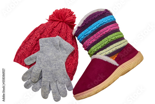 knitted cap with gloves and boots,warm winter clothes for a girl on a white background