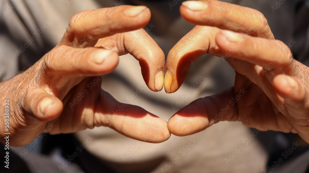 Asian old man showing love with hand Asian old man showing love with hand