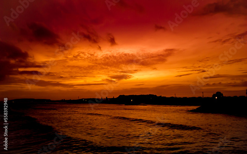 sunset on the beach, Beautiful orange sky atmosphere on Seashore