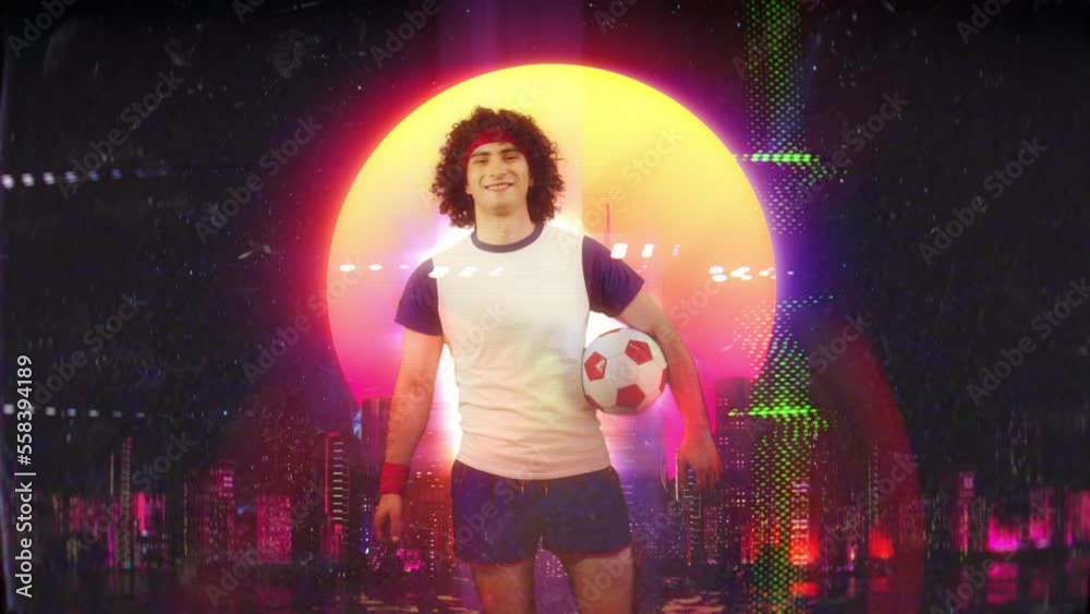 Young man in retro sportswear kicking the ball, football lover, sports fan Young man in retro sportswear kicking the ball, football lover, sports fan