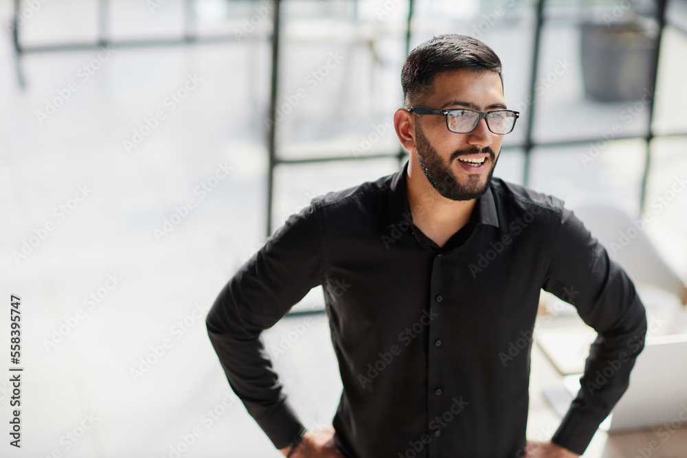 Portrait of smiling young businessman in office Portrait of smiling young businessman in office