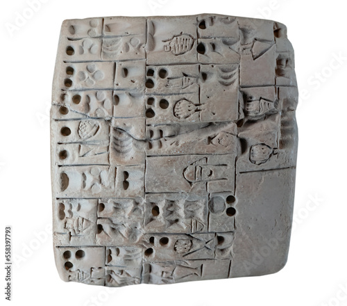 Cuneiform tablet isolated on white.