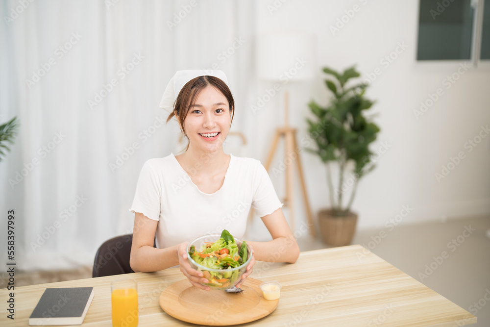 Asian woman dieting Weight loss eating fresh fresh homemade salad healthy eating concept Asian woman dieting Weight loss eating fresh fresh homemade salad healthy eating concept